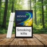 ซองบุหรี่ Mevius Option Blue Yellow สีน้ำเงินดีไซน์พรีเมียม วางบนโต๊ะไม้กลางป่าธรรมชาติ
