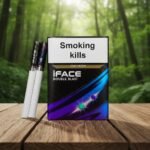 ซองบุหรี่ iFace Double Blast สีดำลายกราฟิกสีม่วงน้ำเงิน วางคู่กับมวนบุหรี่ก้นกรองสีดำบนโต๊ะไม้ฉากหลังป่า