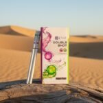 บุหรี่ ESSE Double Shot ขนาดมวน Nano-Slim 2 เม็ดบีบ กลิ่นไวน์แดงและไวน์ขาว วางบนขอนไม้ในทะเลทราย